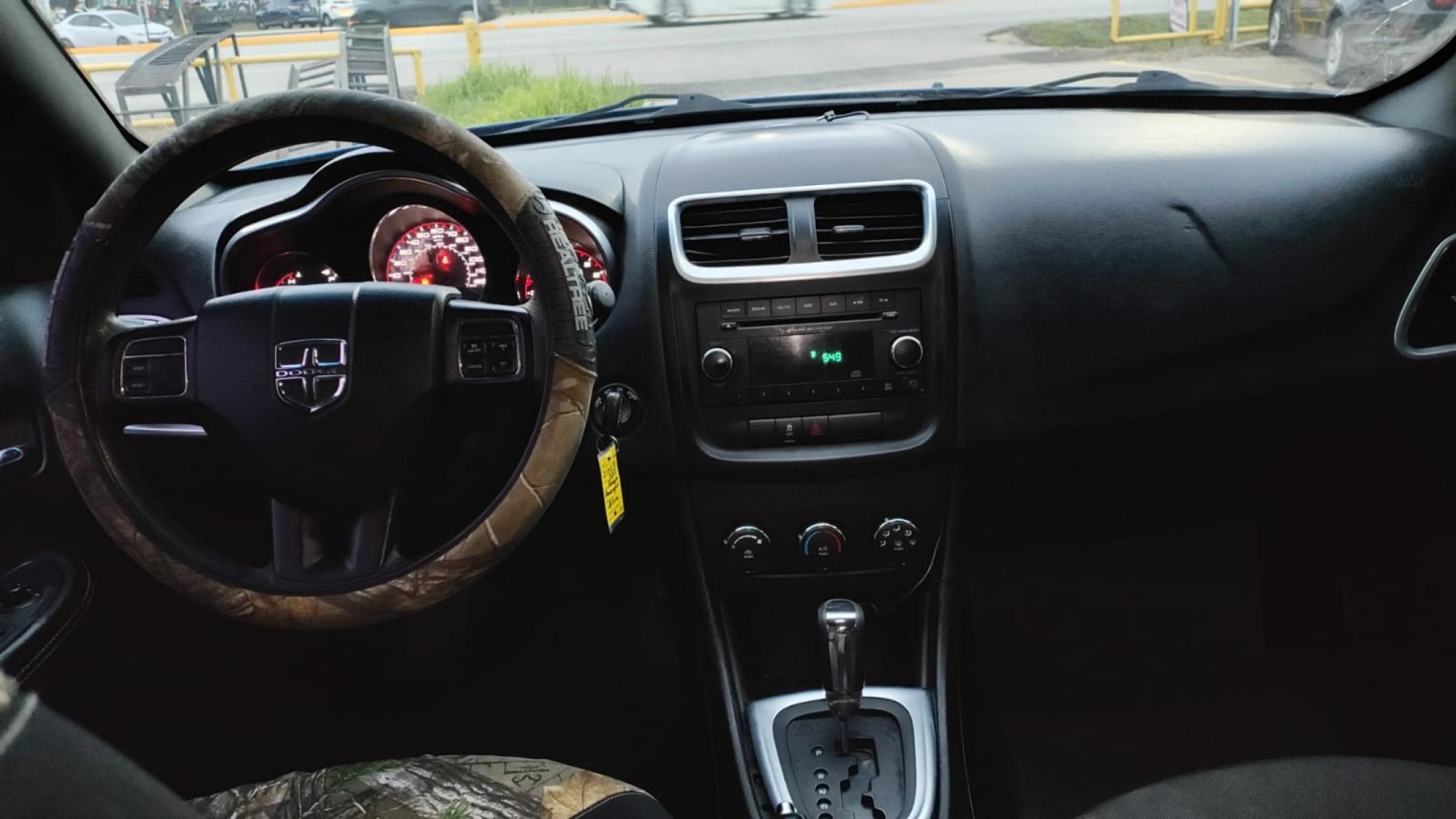 2014 Dodge Avenger SE (1C3CDZAB6EN) with an 2.4L L4 DOHC 16V engine, 4-Speed Automatic transmission, located at 16710 Clay Rd., Houston, TX, 77084, (281) 859-7900, 29.834864, -95.656166 - Photo #1